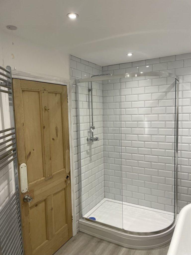 Bathroom With White Brick Tiles