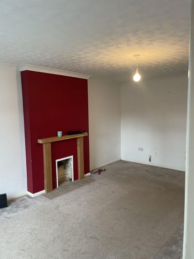 Living Room With Red Feature Wall